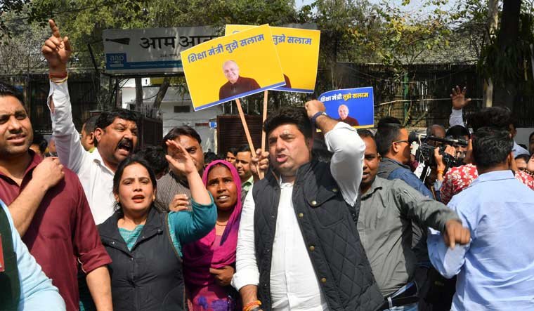 AAP workers protest in Delhi against the arrest of Manish Sisodi