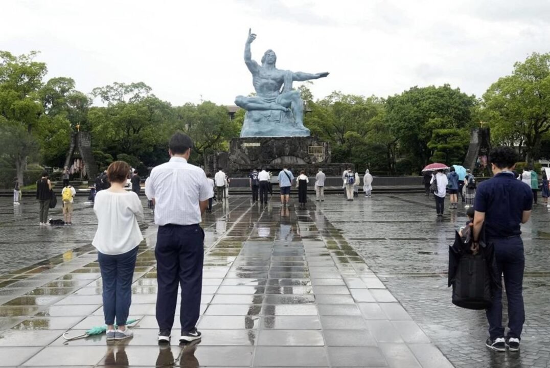 People offer silent prayers for the victims of the 1945 atomic bombing to mark the 78th anniversary of the bombing in Nagasaki