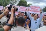 Protesters scuffle